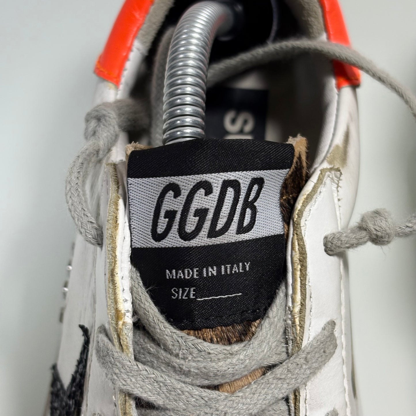 Golden goose superstar bianche tallone arancio e stella nera brillantinata 35