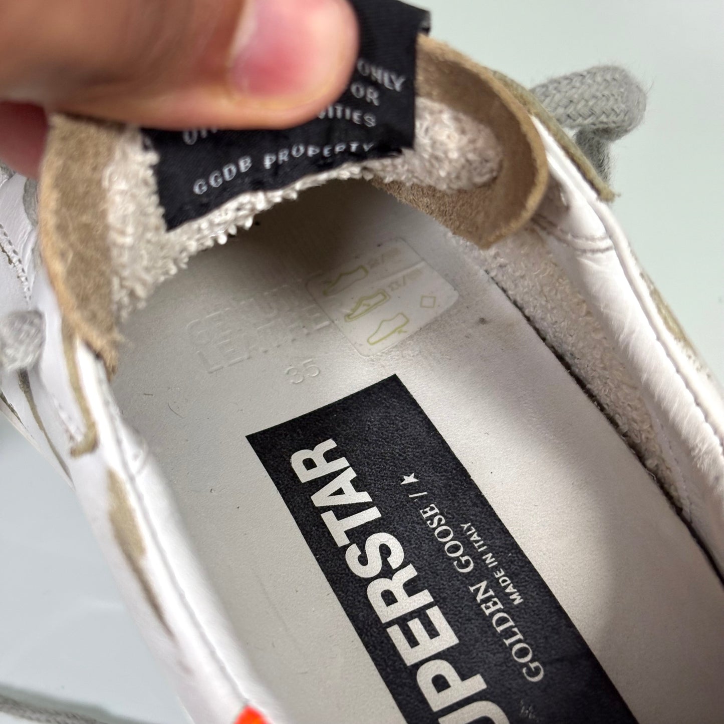 Golden goose superstar bianche tallone arancio e stella nera brillantinata 35