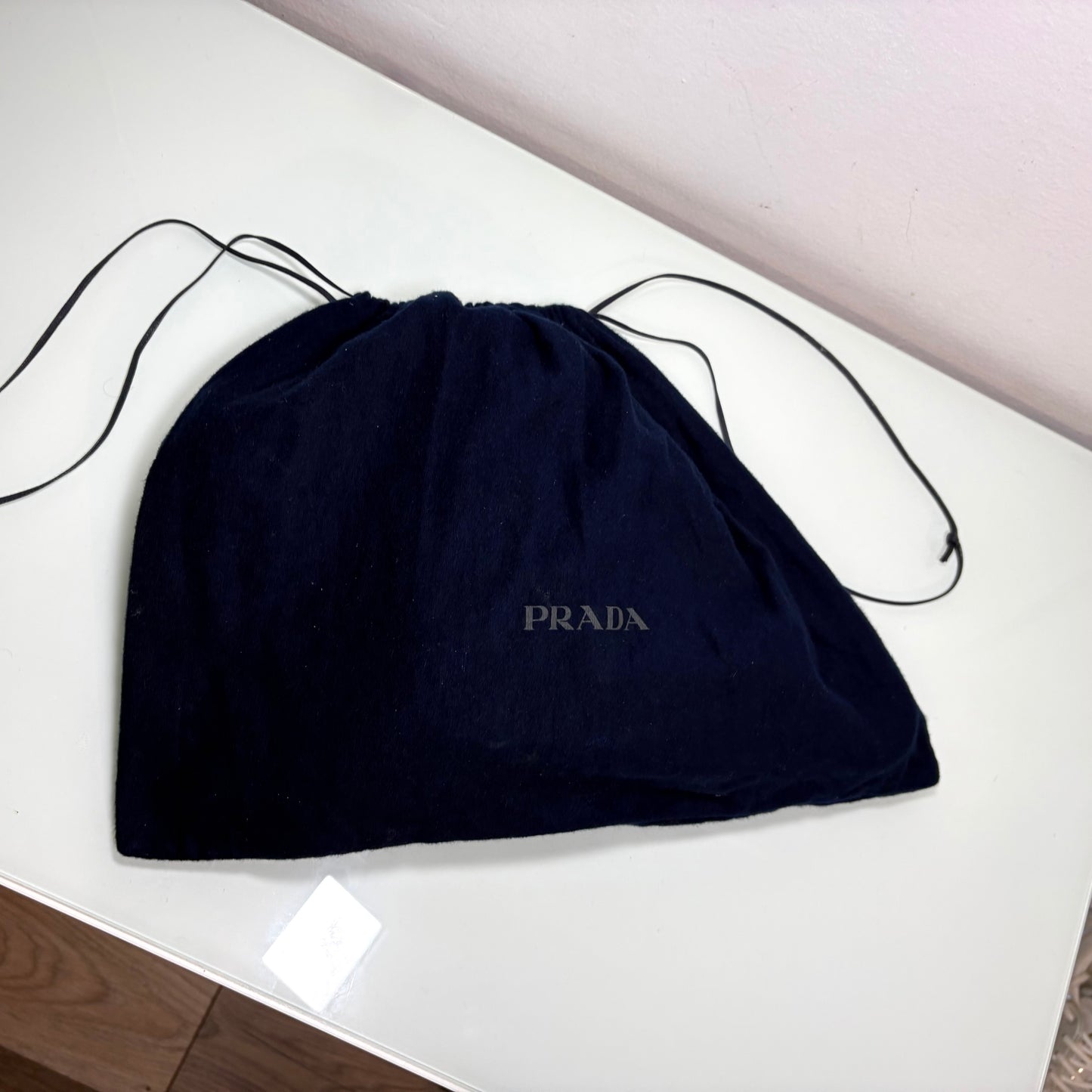 Prada Triangle in pelle bianco