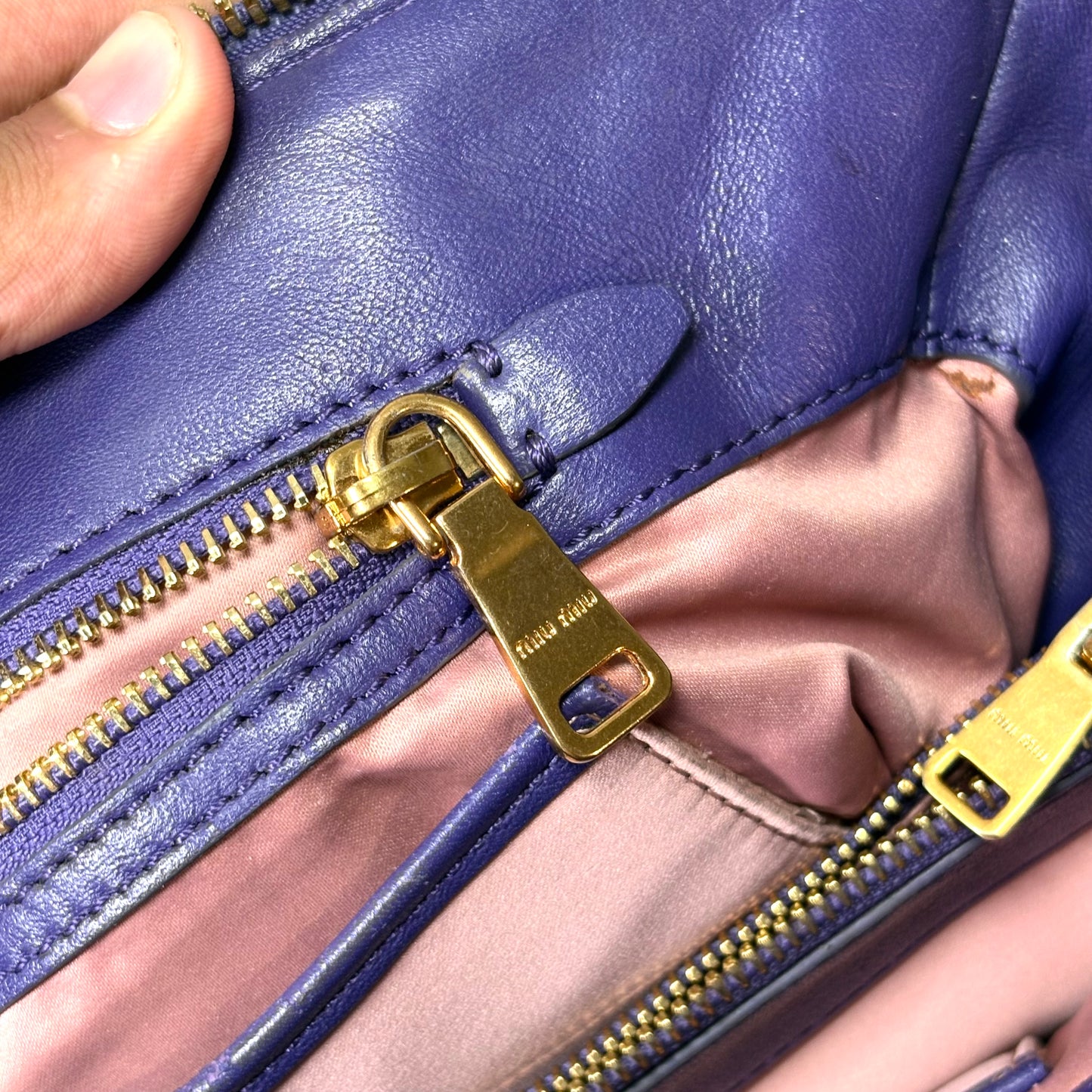 Miu Miu matelassé in pelle Viola