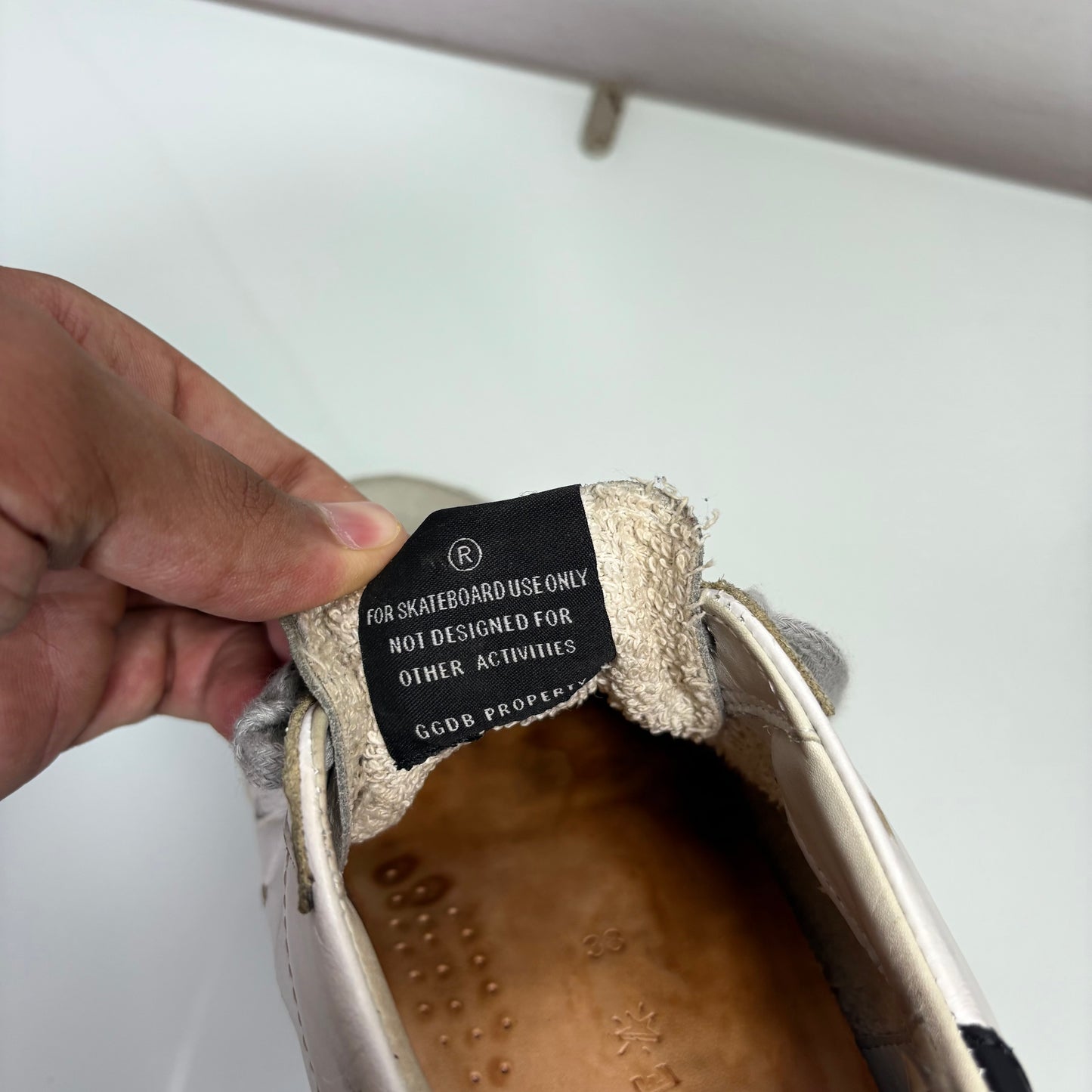 Golden goose superstar in pelle bianche e stella gialla 38