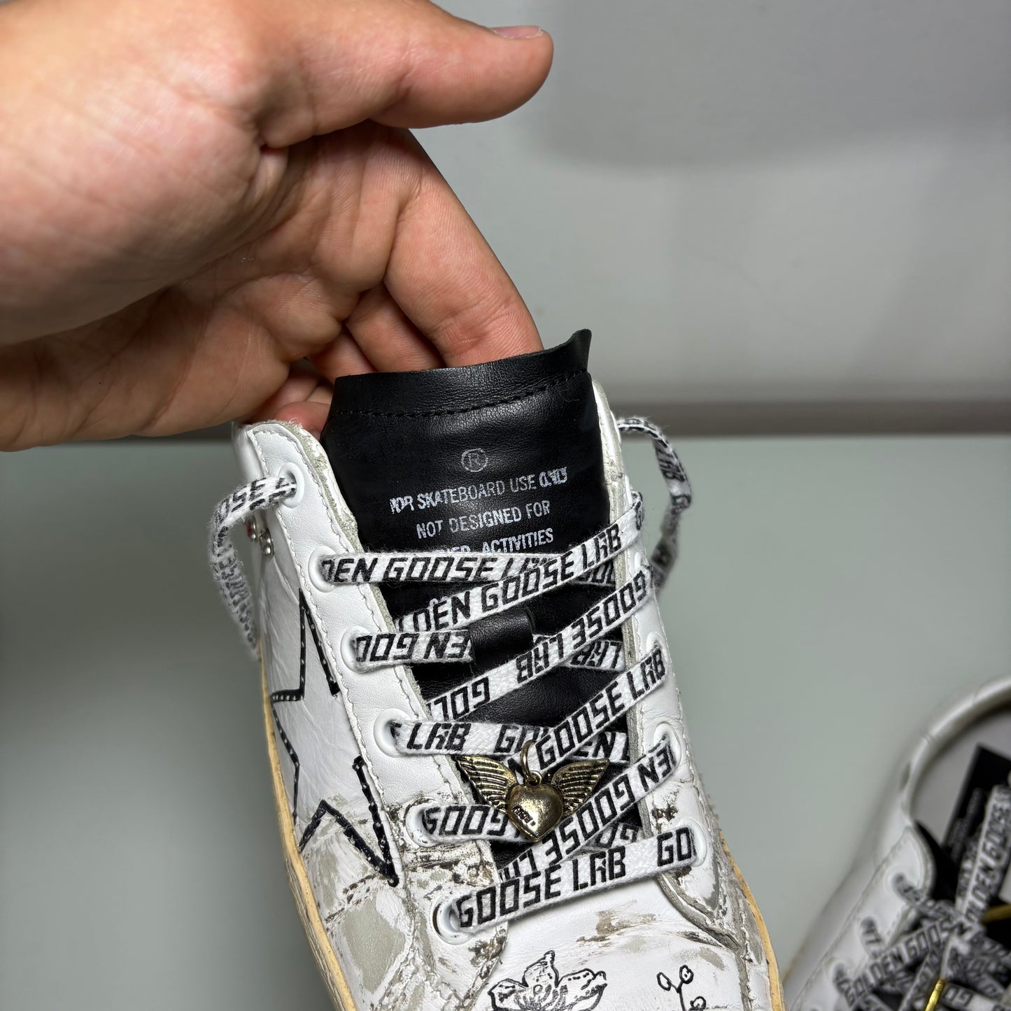 Golden goose bianche con disegni floreali e inserti oro 38