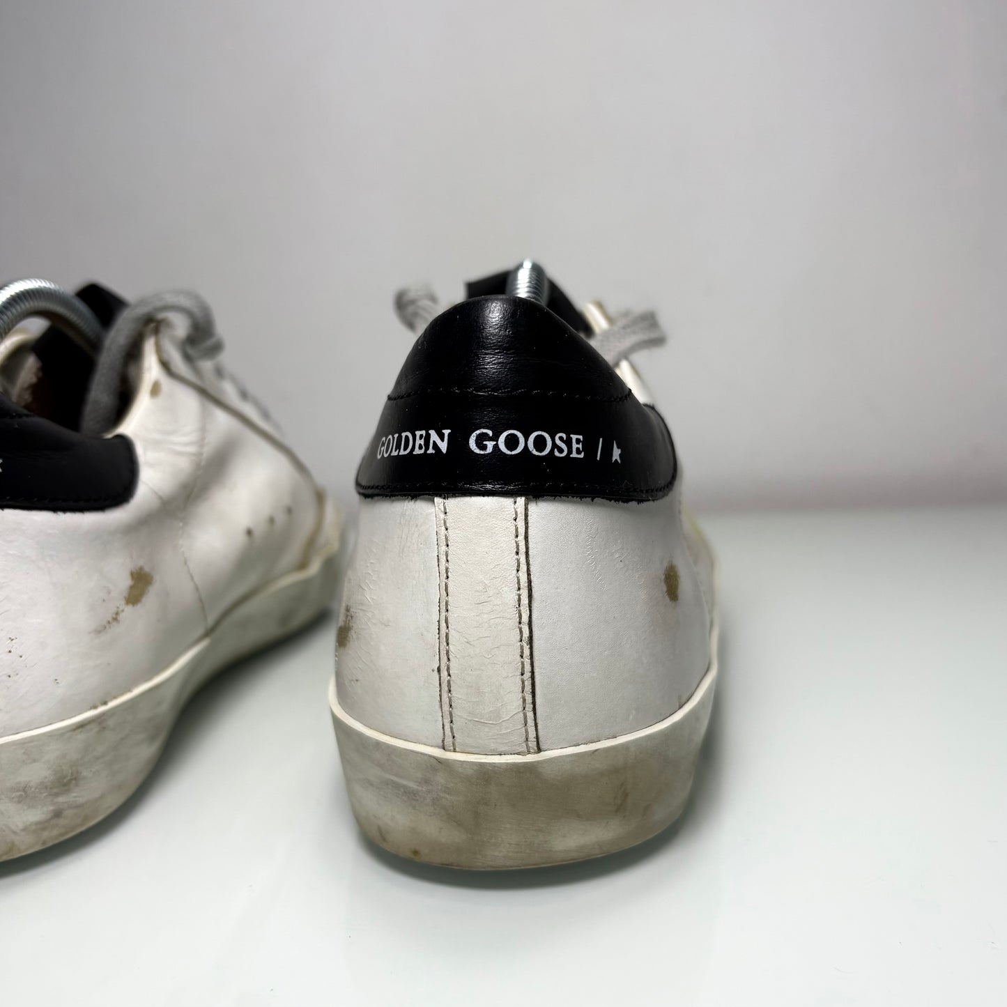 Golden goose superstar in pelle bianche e stella gialla 38
