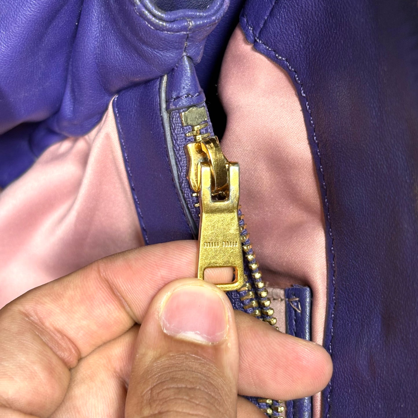 Miu Miu matelassé in pelle Viola