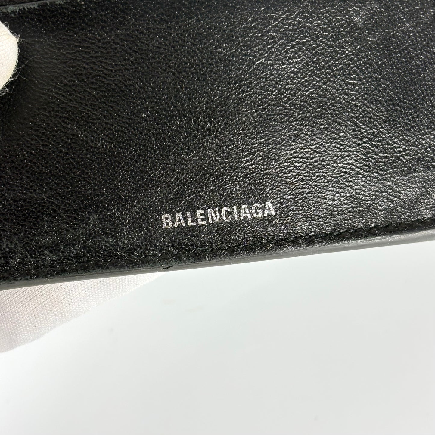 Balenciaga Cash Square in pelle di vitello nera e logo bianco