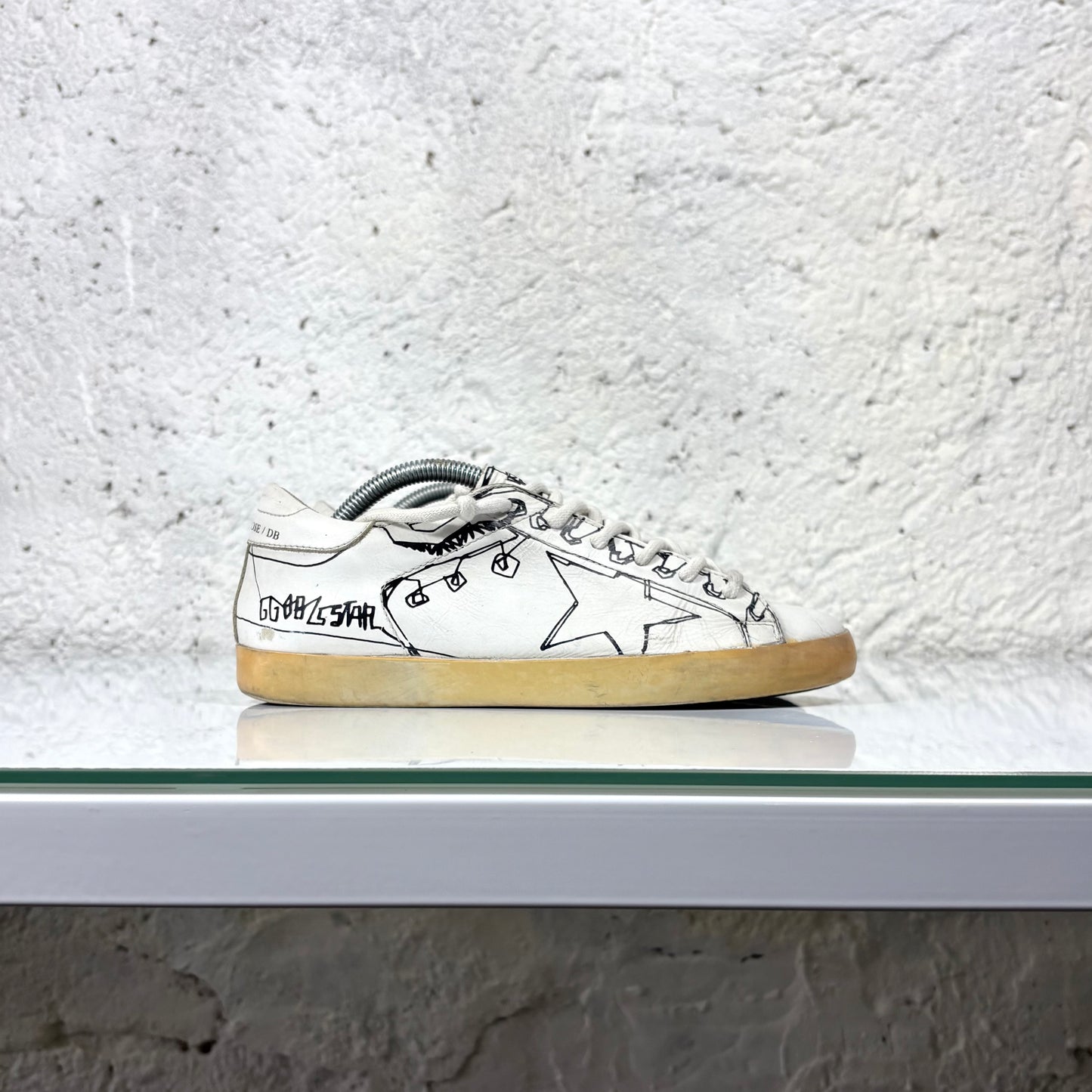 Golden goose Superstar bianche con disegni stilizzati 38