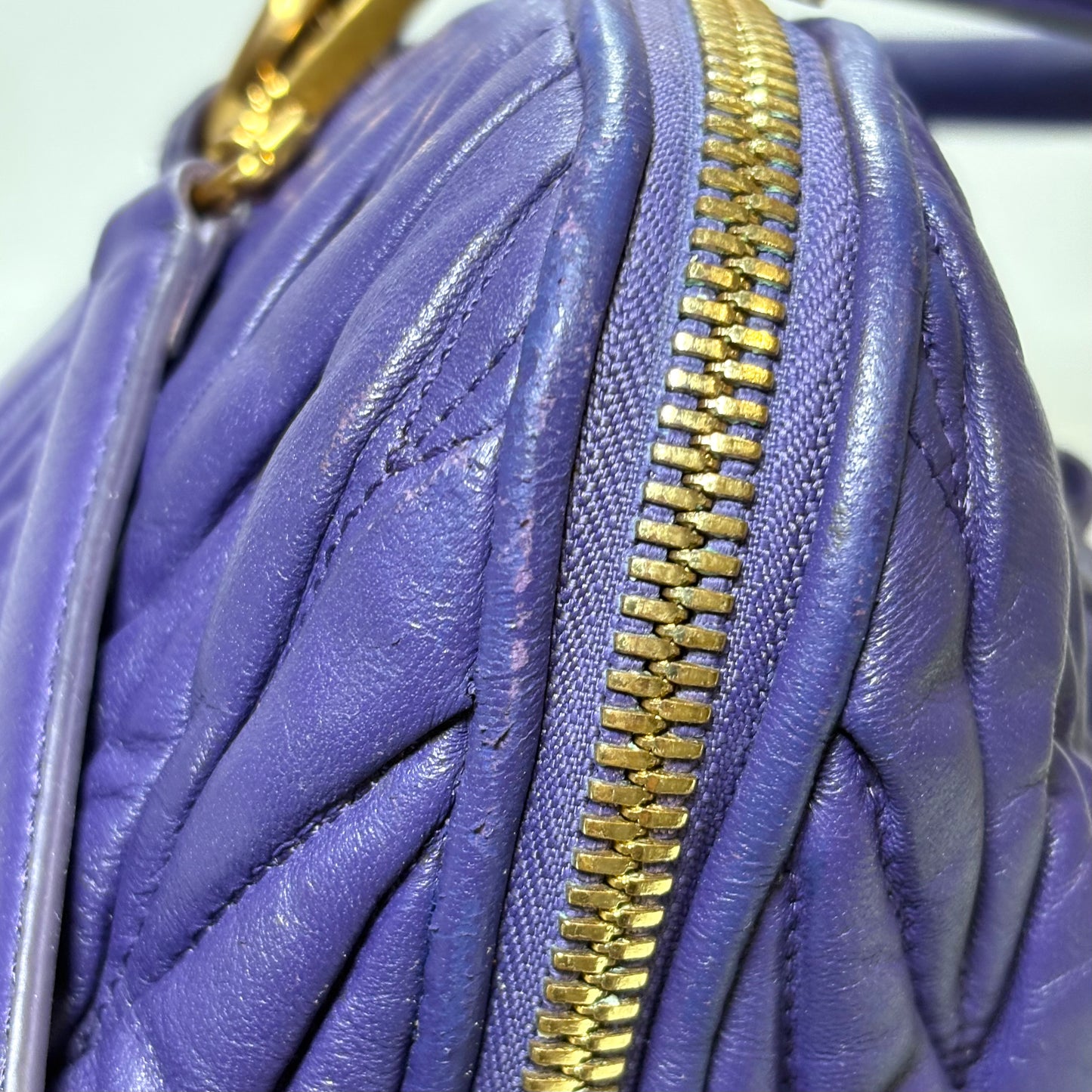 Miu Miu matelassé in pelle Viola