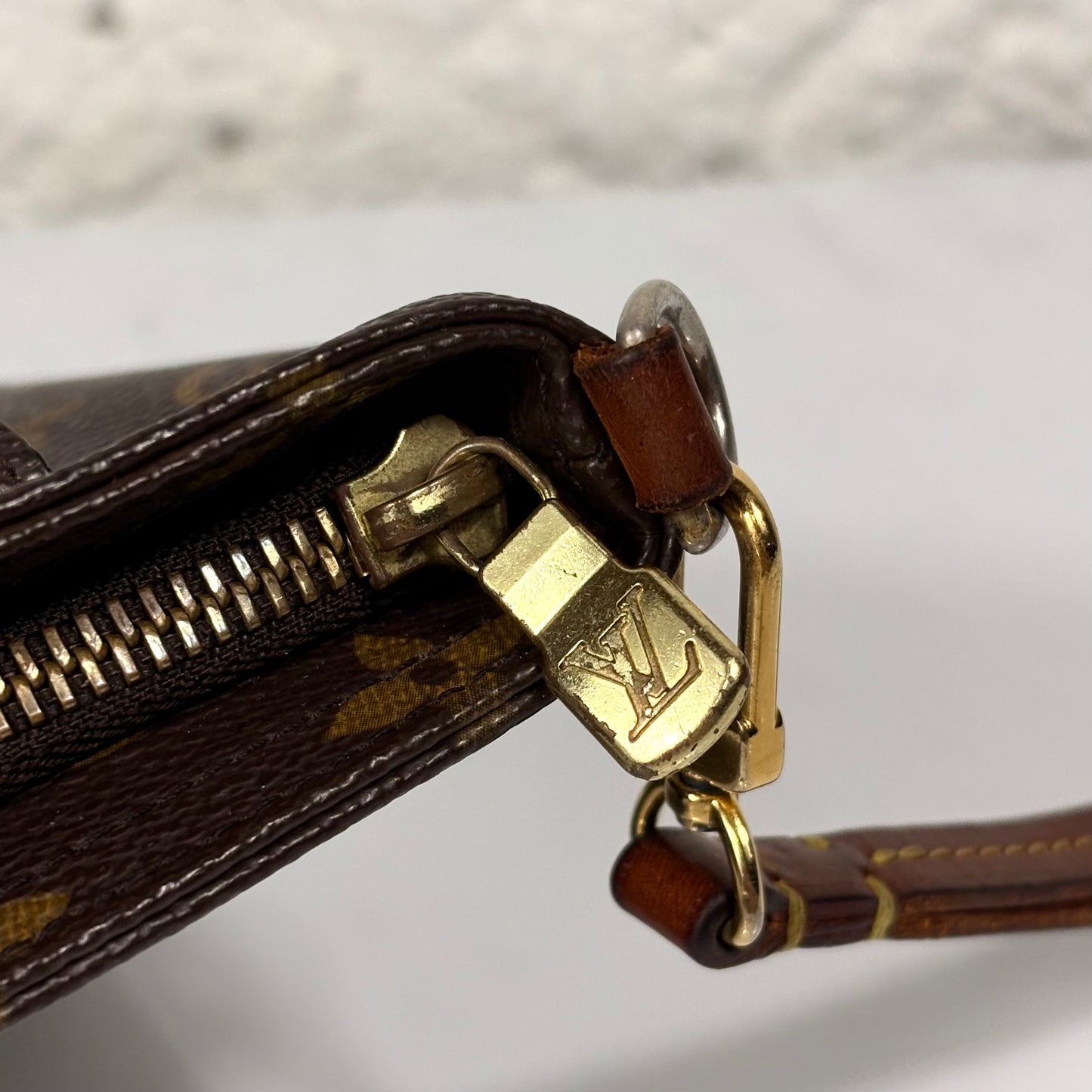 Louis Vuitton pochette partition monogram brown