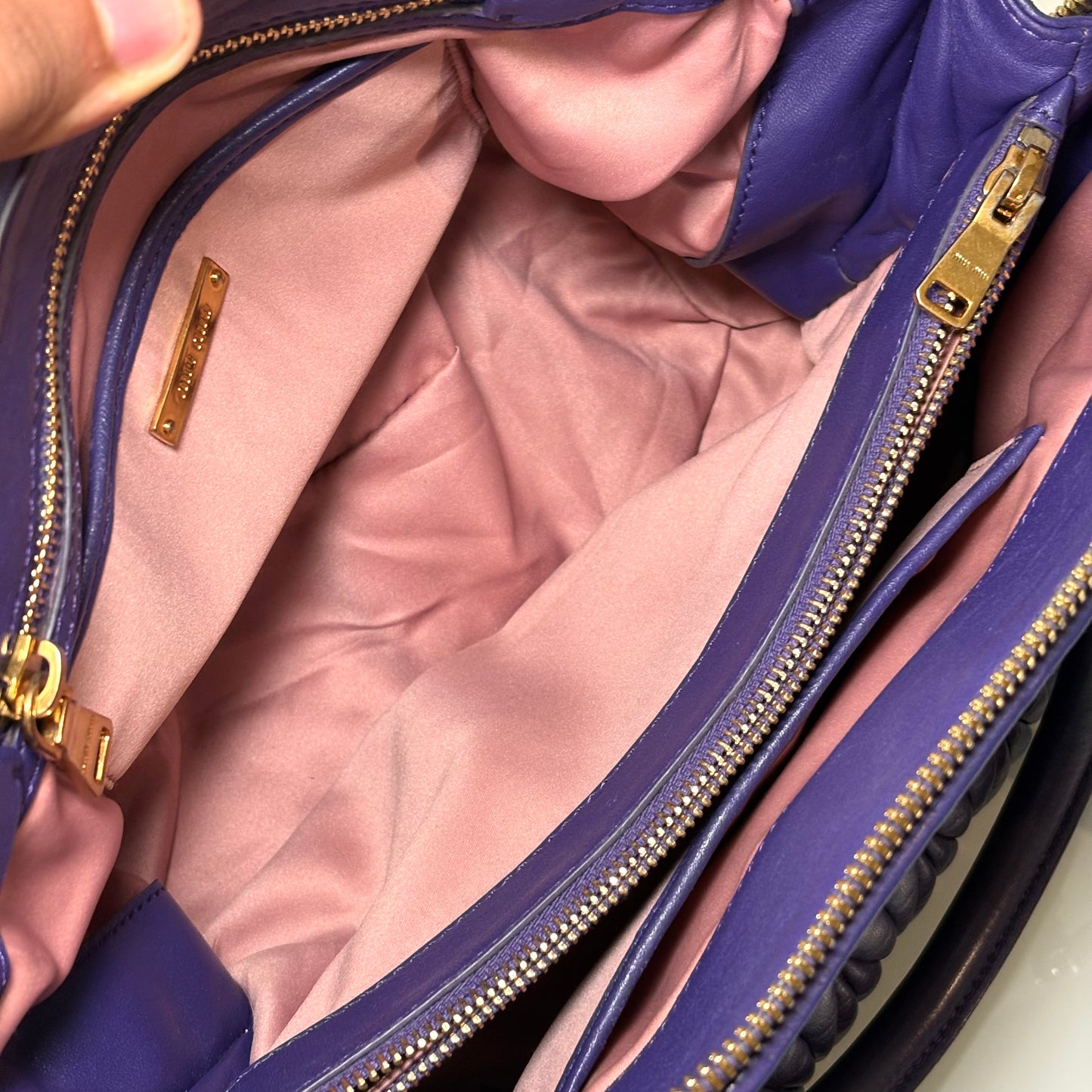 Miu Miu matelassé in pelle Viola