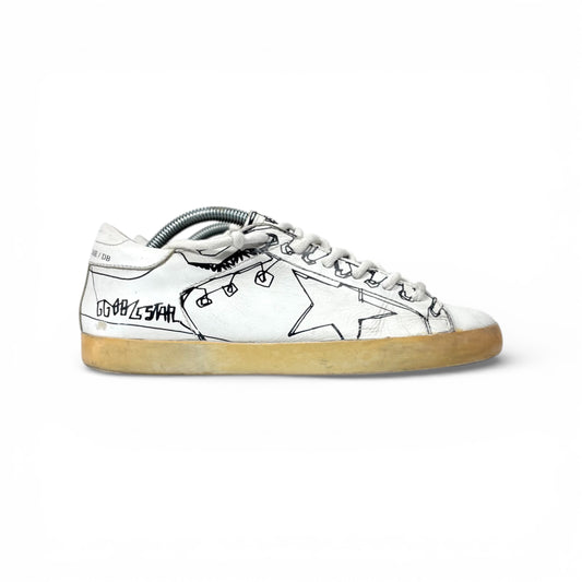Golden goose Superstar bianche con disegni stilizzati 38