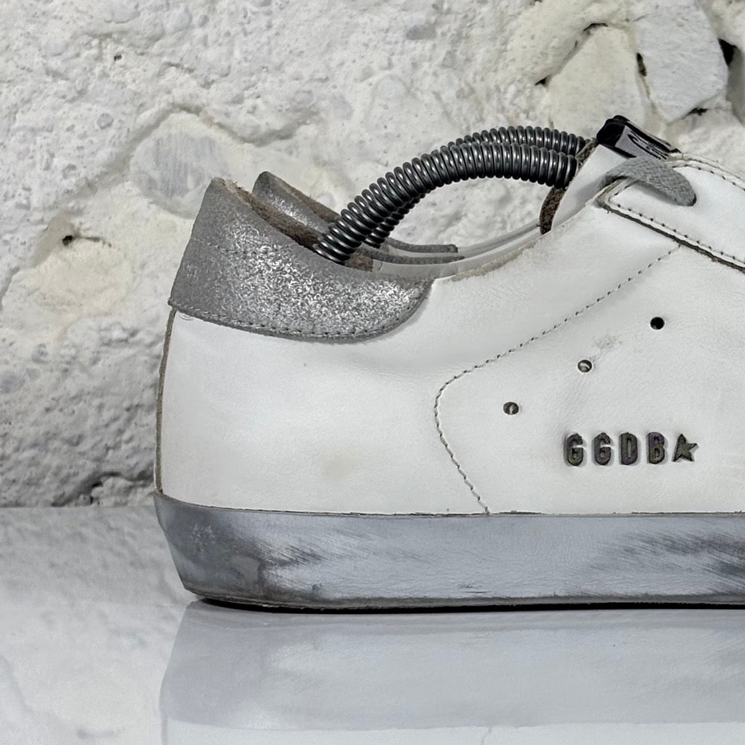 Golden goose Superstar bianche con stella, talloncini e fascia-suole argento 42