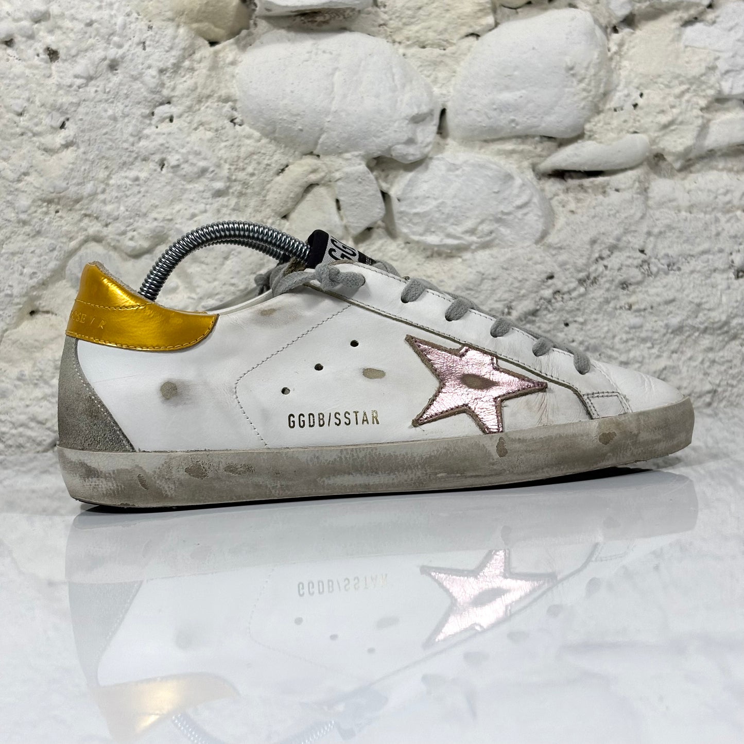 Golden Goose Superstar bianche con stella argento e talloncini arancio 39