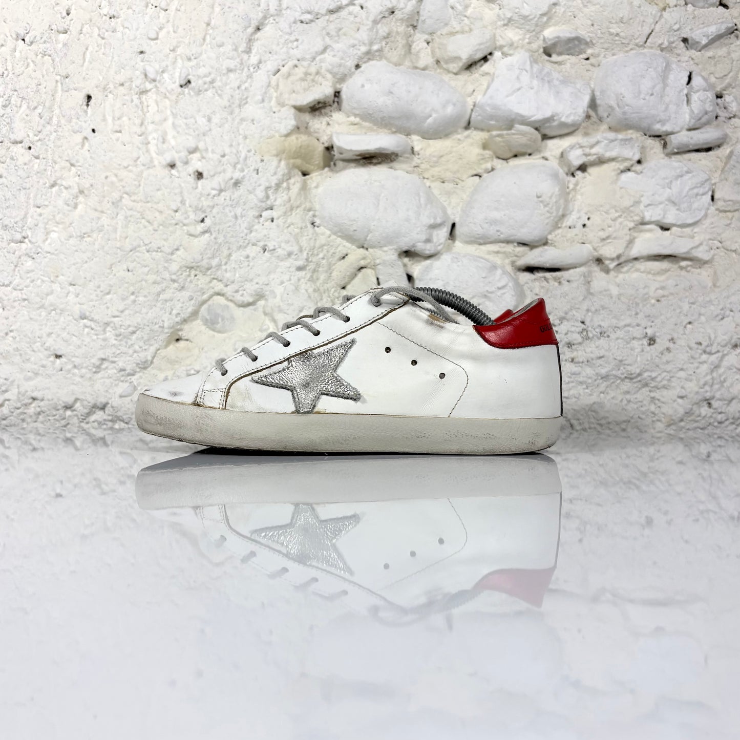 Golden goose Superstar bianche con stella argento e talloncino rosso 37