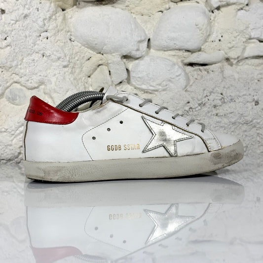 Golden goose Superstar bianche con stella argento e talloncino rosso 37