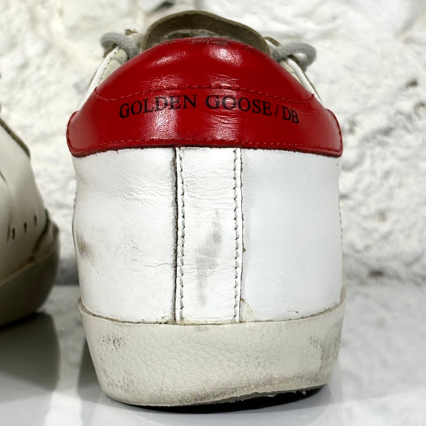 Golden goose Superstar bianche con stella argento e talloncino rosso 37