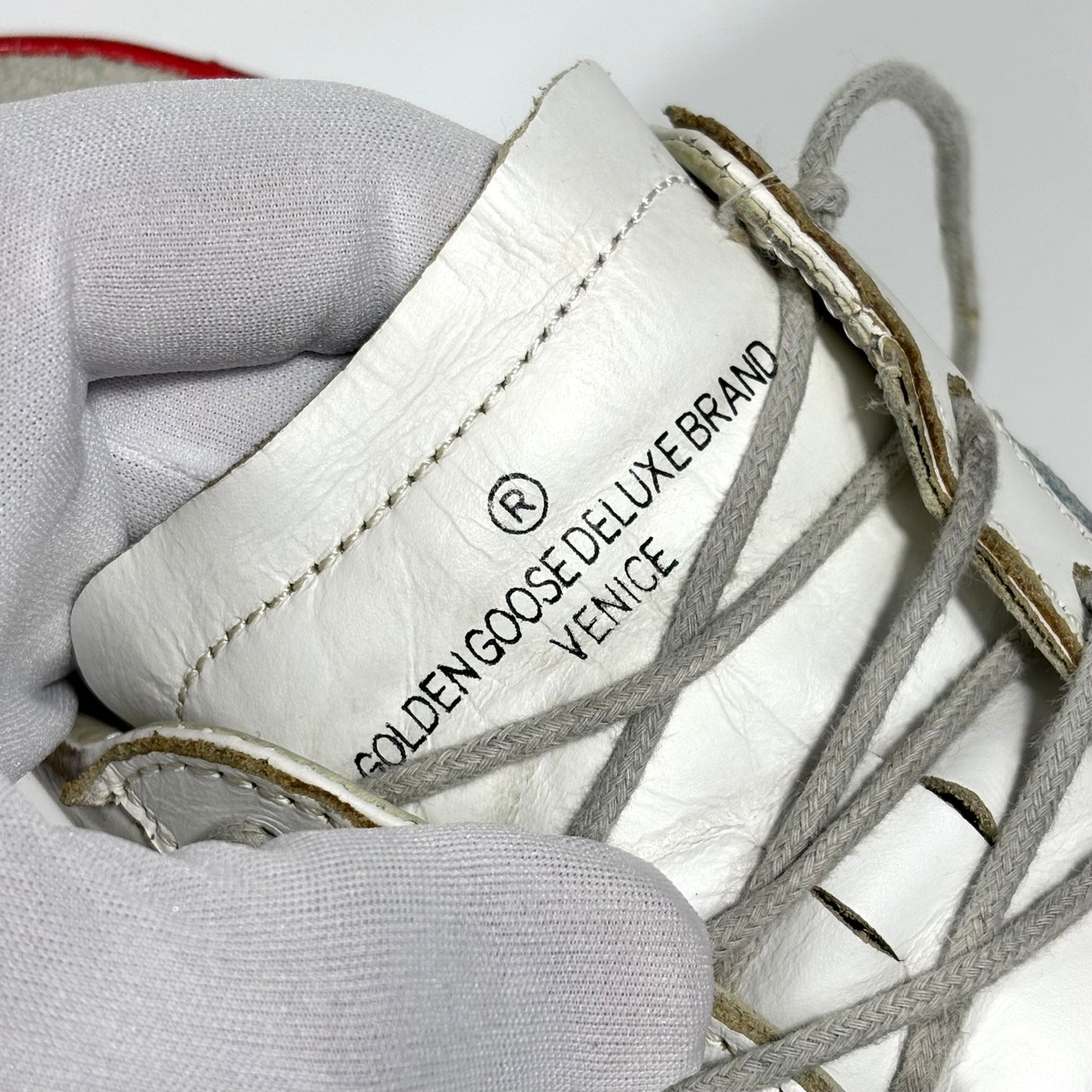 Golden goose Superstar bianche con stella argento e talloncino rosso 37