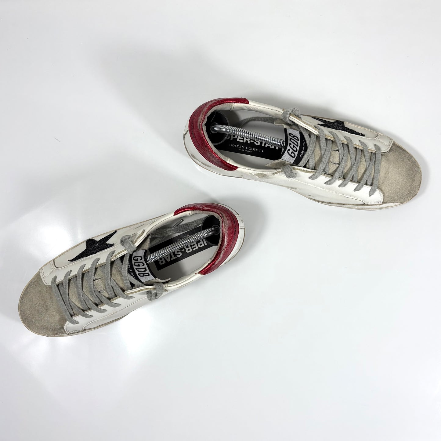 Golden goose Superstar bianche con stella nera brillantinata e talloncini rossi 40