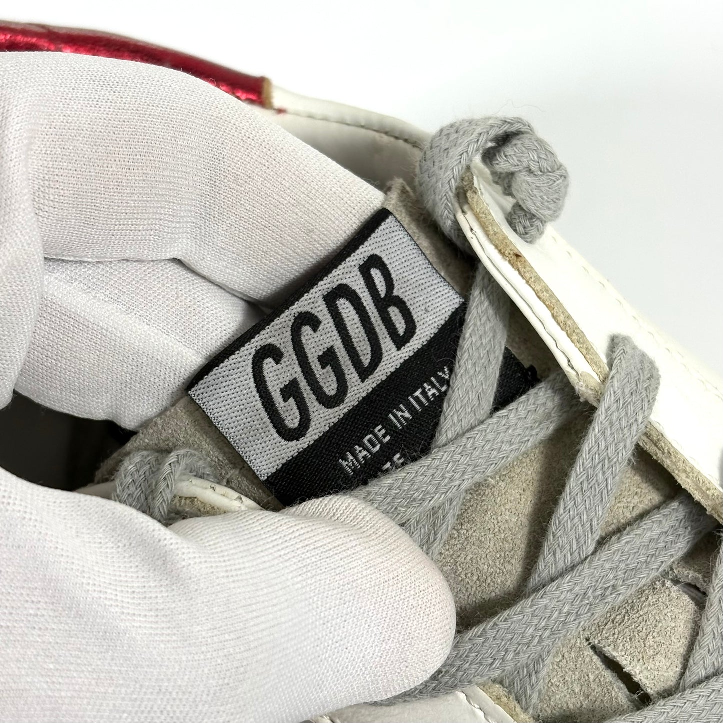 Golden goose Superstar bianche con stella nera brillantinata e talloncini rossi 40