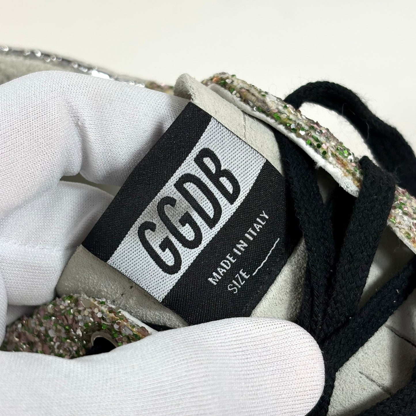 Golden goose Superstar in paillettes argento e oro su tomaia verde, talloncini argento e stella fucsia 41