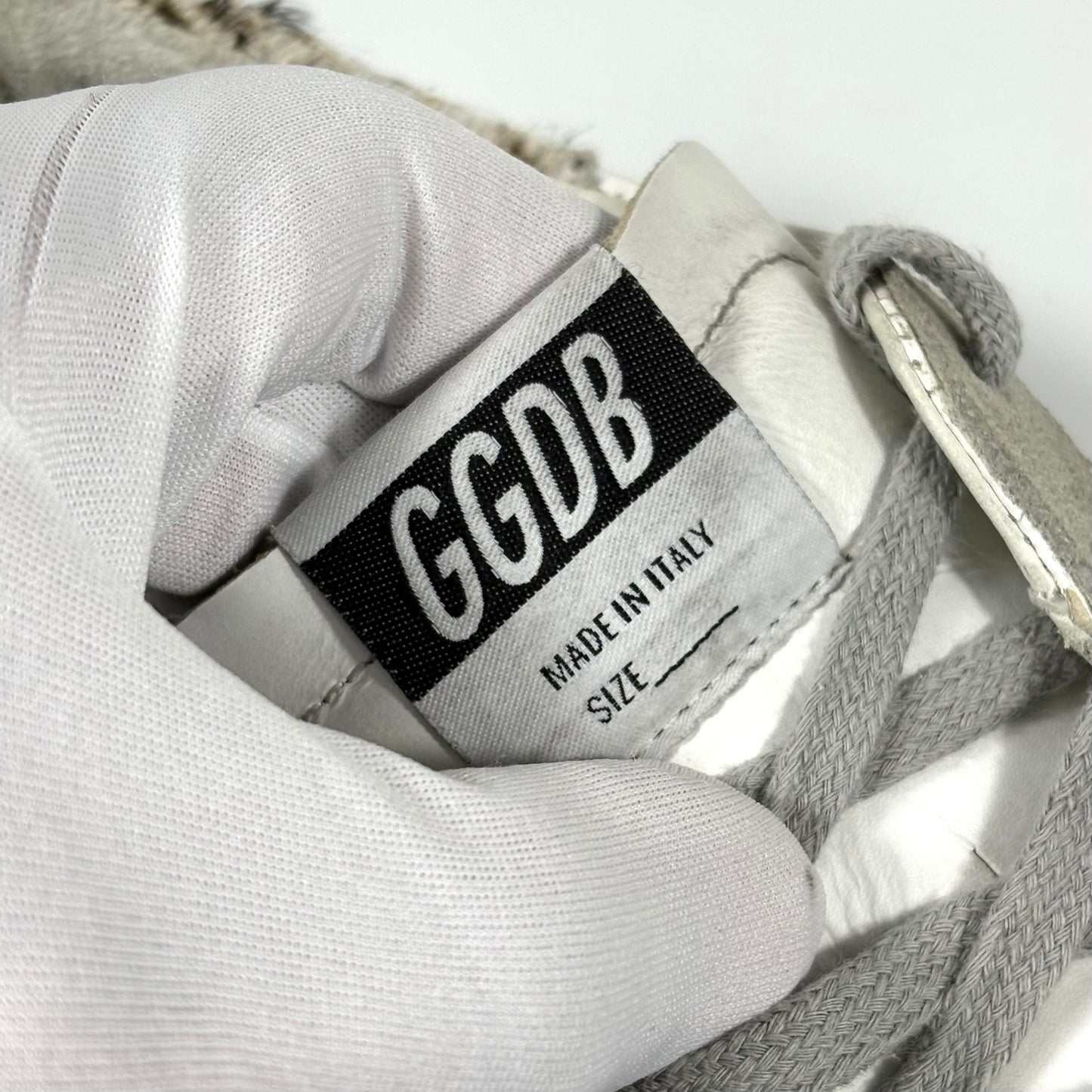 Golden goose Superstar bianche con stella argento e talloncini zebrati 41