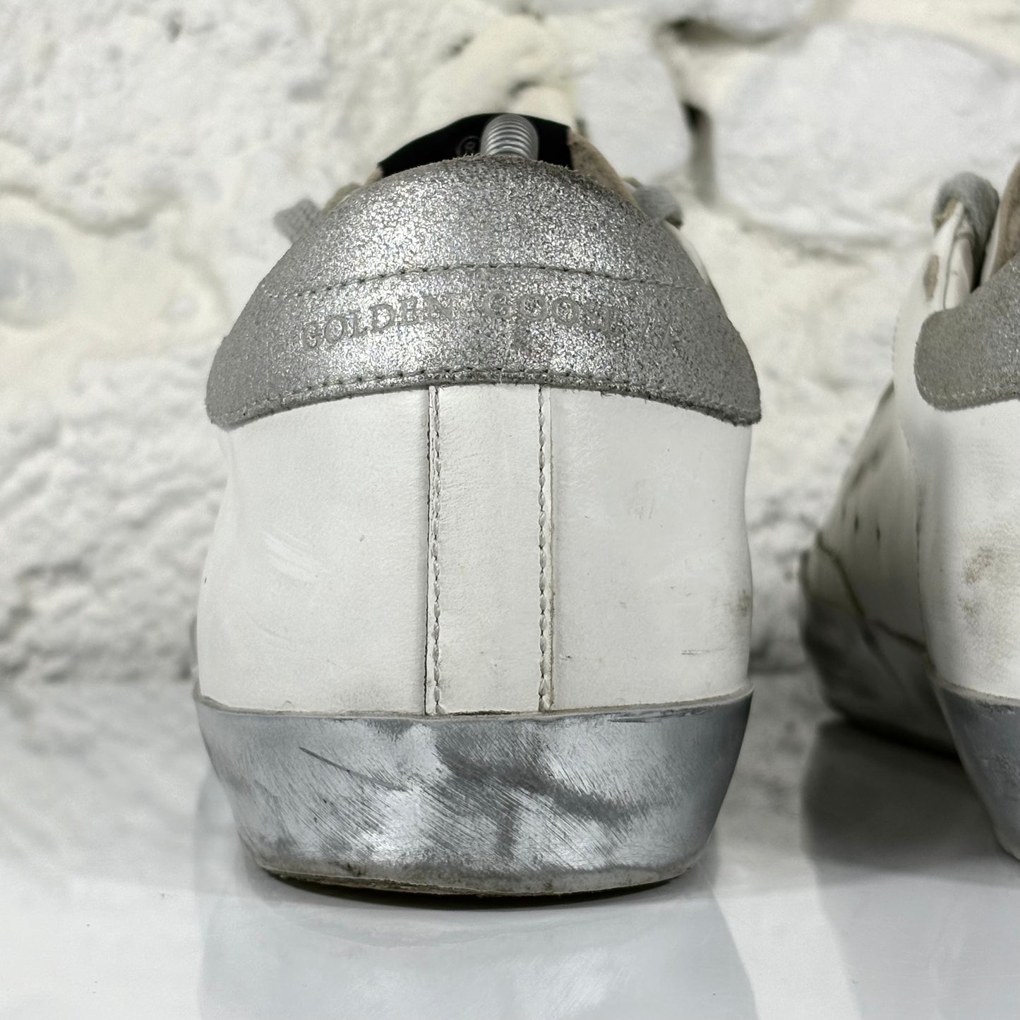 Golden goose Superstar bianche con stella, talloncini e fascia-suole argento 42