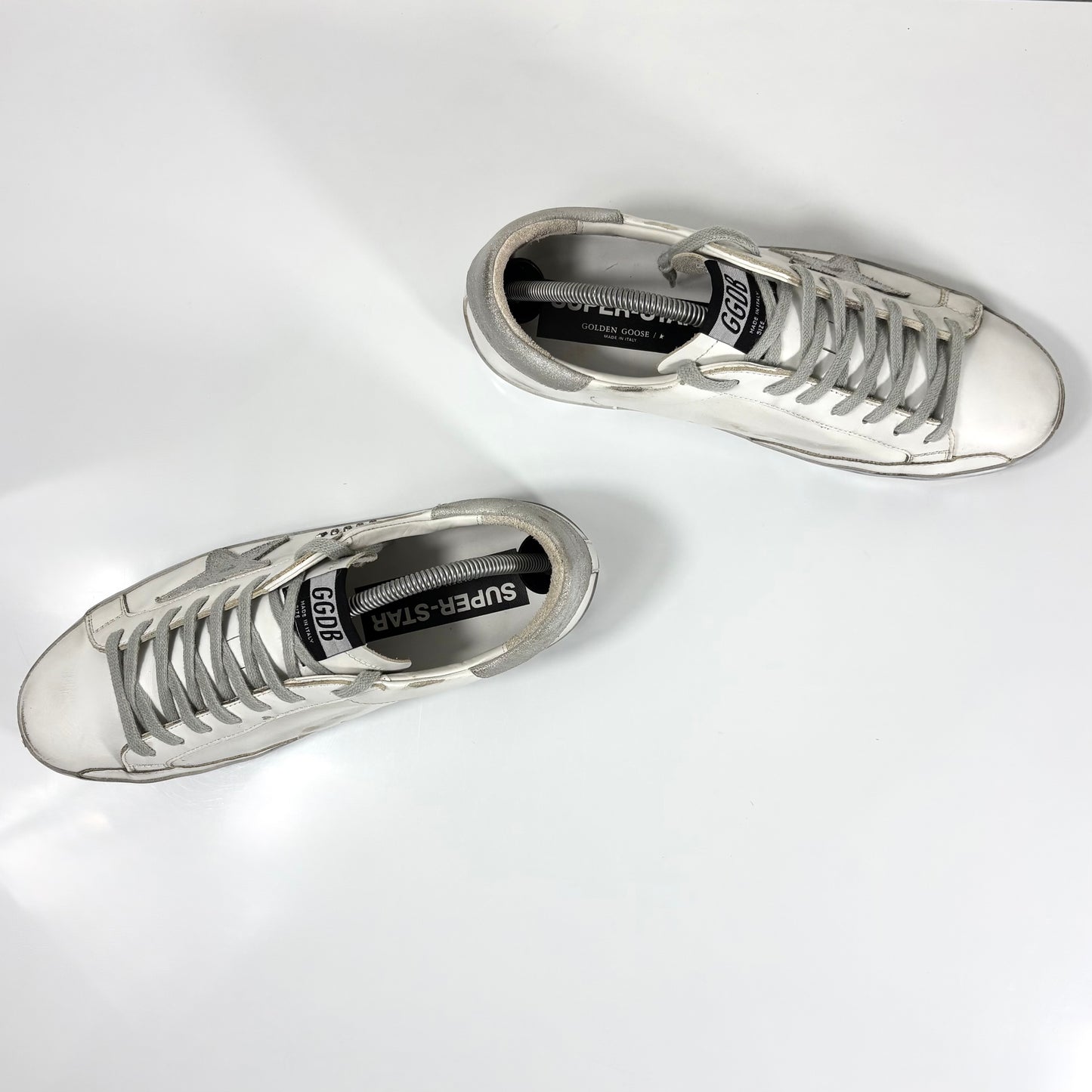 Golden goose Superstar bianche con stella, talloncini e fascia-suole argento 42