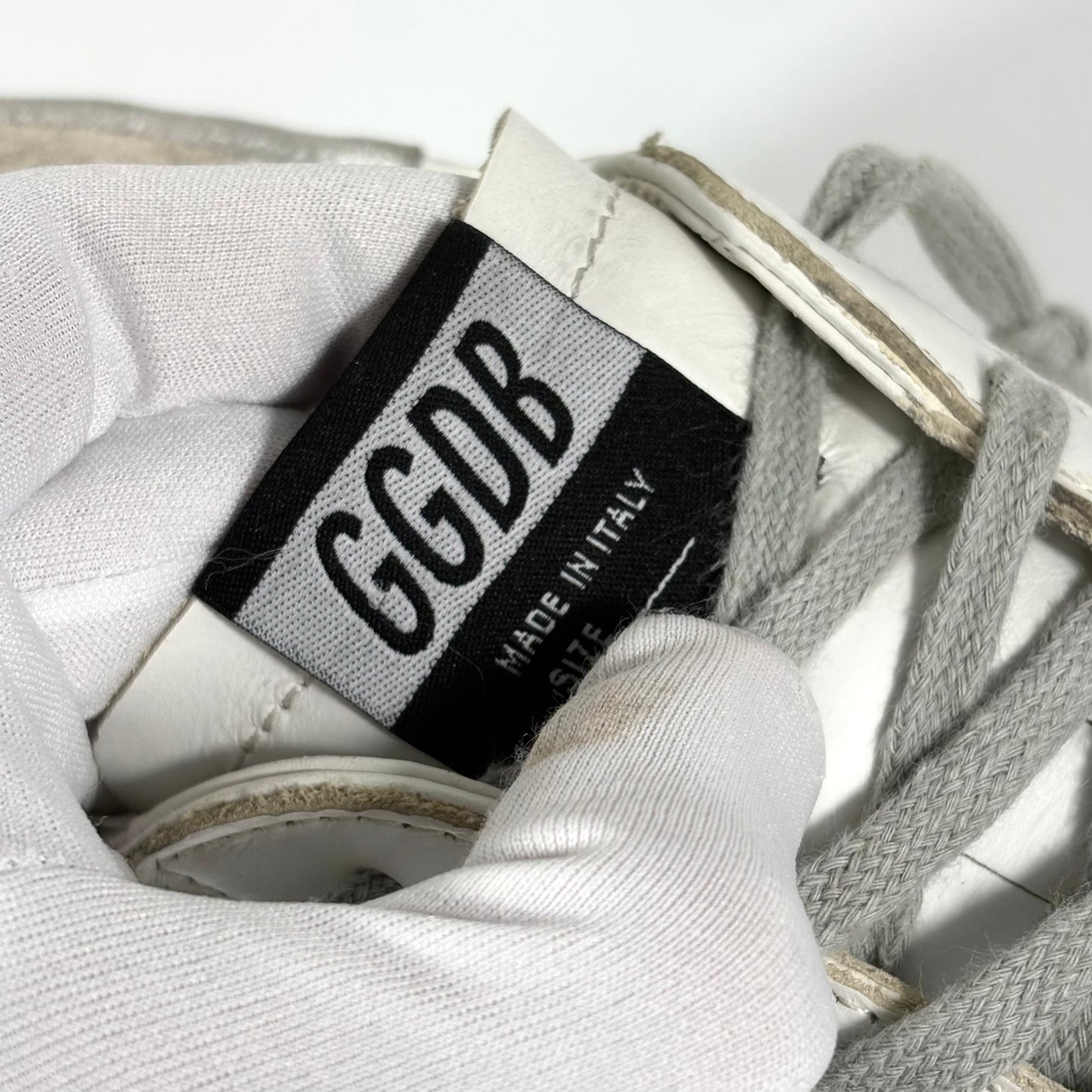 Golden goose Superstar bianche con stella, talloncini e fascia-suole argento 42